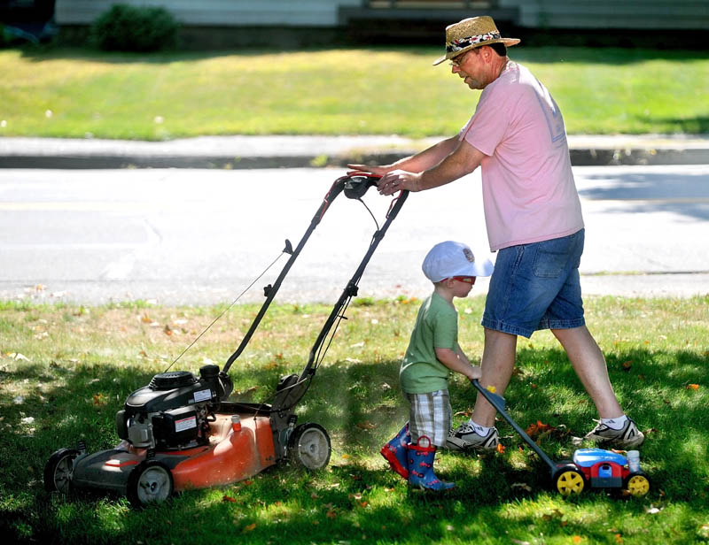Mowing the lawn with Grandpa.