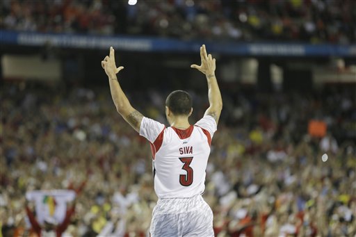 Louisville Beats Michigan, 82-76, to Win National Championship