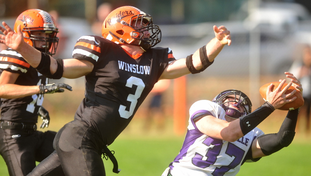 Winslow steamrolls Waterville football team