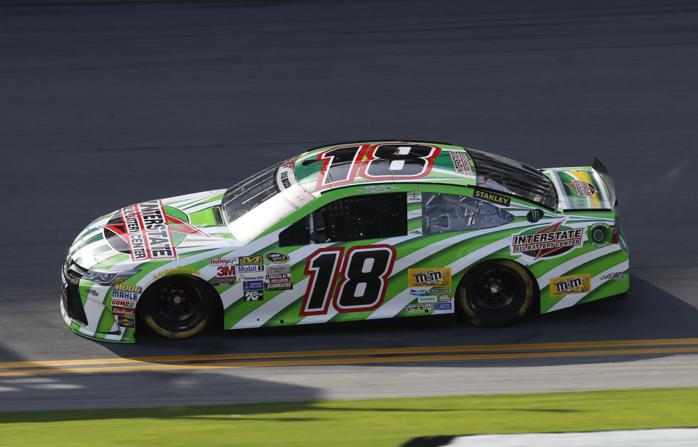 Kyle Busch drives his backup car during a NASCAR Sprint Cup practice session Friday at Daytona International Speedway in Daytona Beach, Fla. Busch was involved in a crash earlier and had to go to his backup car for the second practice session.