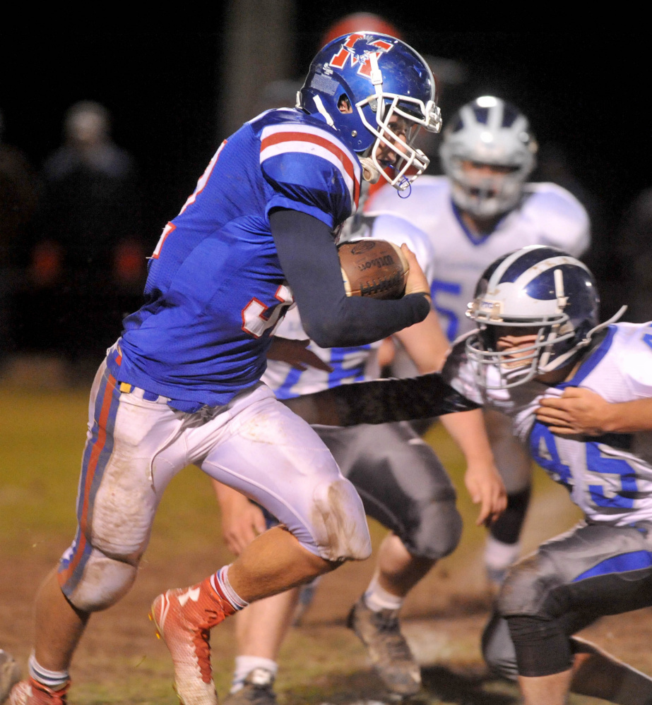 Messalonskee running back Jack Bernatchez breaks through the Lawrence defensive line for a touchdown late in the second quarter of an Oct. 23 game in Fairfield. Bernatchez was named a James J. Fitzpatrick Trophy semifinalist Monday.