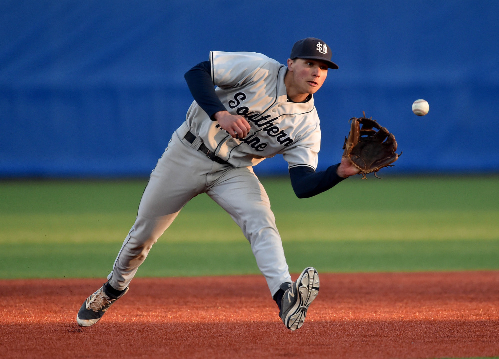 University of Southern Maine shortstop Sam Dexter fields a ground ball during a game earlier this season at Colby College in Waterville.