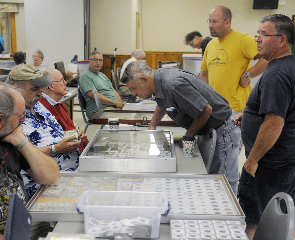 Semiannual Augusta coin show allows collectors to turn hobby into