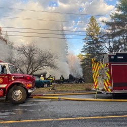 Firefighters battle a house fire on Waterville Road in Skowhegan Thursday around 4:30 p.m. The home was destroyed and its owner was injured, fire Chief Ronnie Rodriguez said.